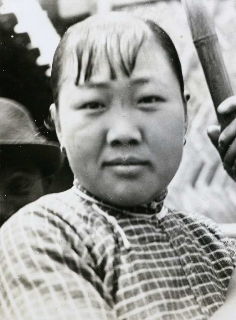 A young woman with bamboo