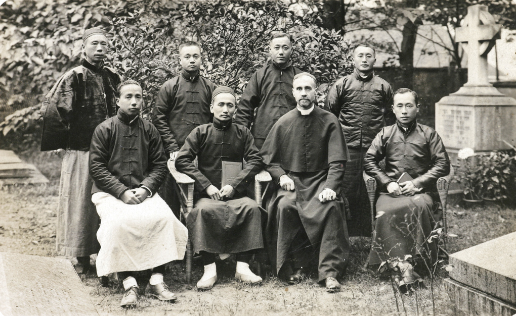 Chinese theological students in a churchyard