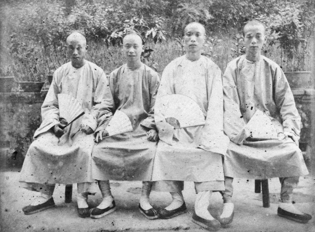 Four Chinese men with fans, 1890s