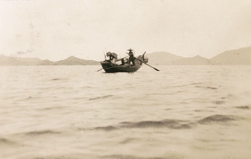 Fishermen in a small boat