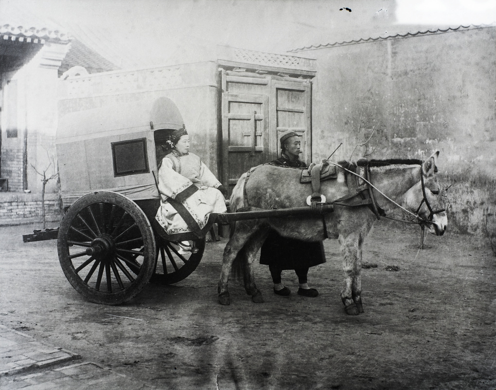 Couple with Peking cart