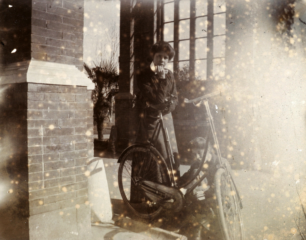 Carrall sisters with a bicycle, 1902