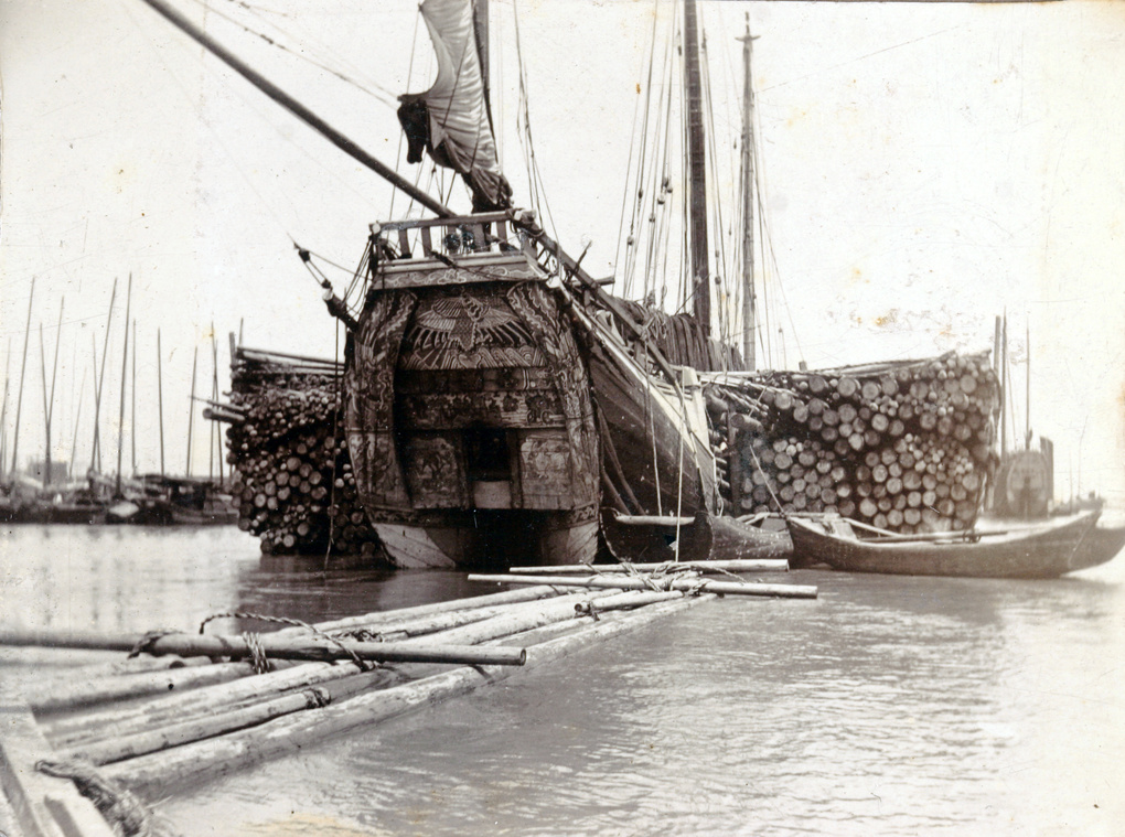 A Fuzhou (Foochow) pole junk, with a full cargo of poles lashed to the sides, Shanghai