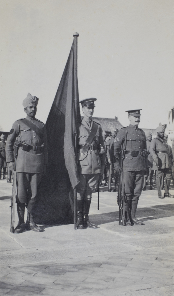 Captain Clayton Jones carrying Portuguese colours, Review of Allied Troops, Forbidden City, Beijing