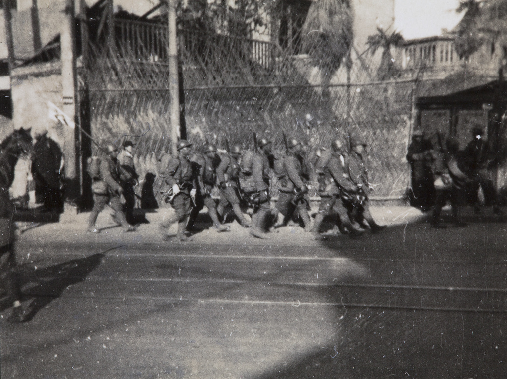 Japanese troops withdrawing after ceasefire agreement, Shanghai, 1932