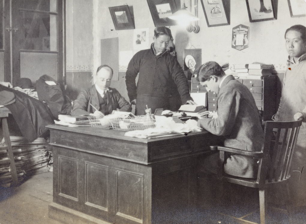 An office, probably at 'The Peking & Tientsin Times', Tianjin