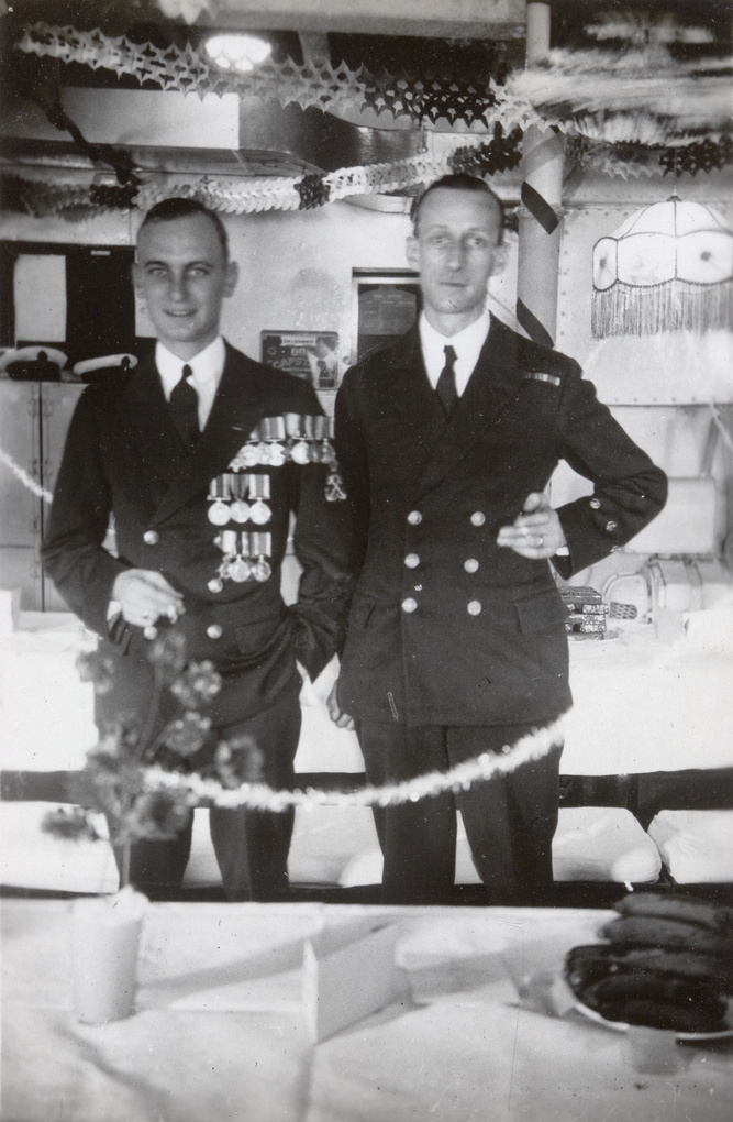 Two Royal Navy personnel at a Christmas party, Hong Kong