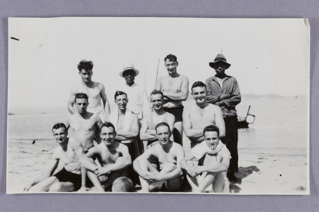 F. Hagger with other picnic party men on a beach, Weihai (威海)