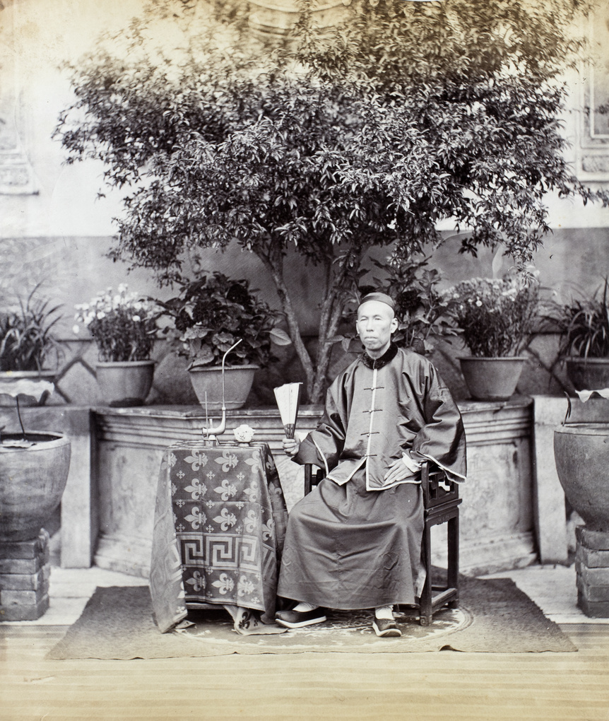 Hopchun, a tea merchant, with a tea bowl and a tea plant