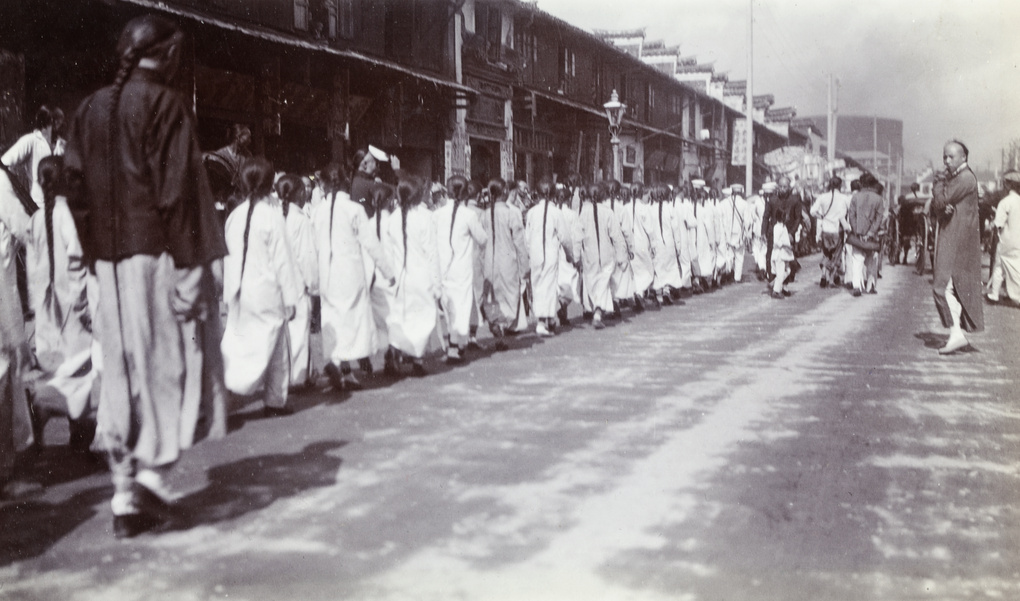 Toung mourners in a funeral procession, Shanghai