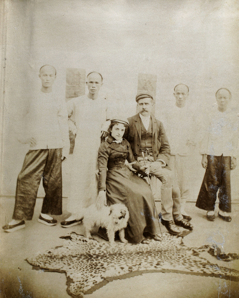 Dr J. H. and Mrs Lowry and servants at Hoihow, 1898