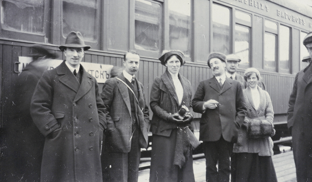 Europeans beside a Trans-Siberian Railway carriage