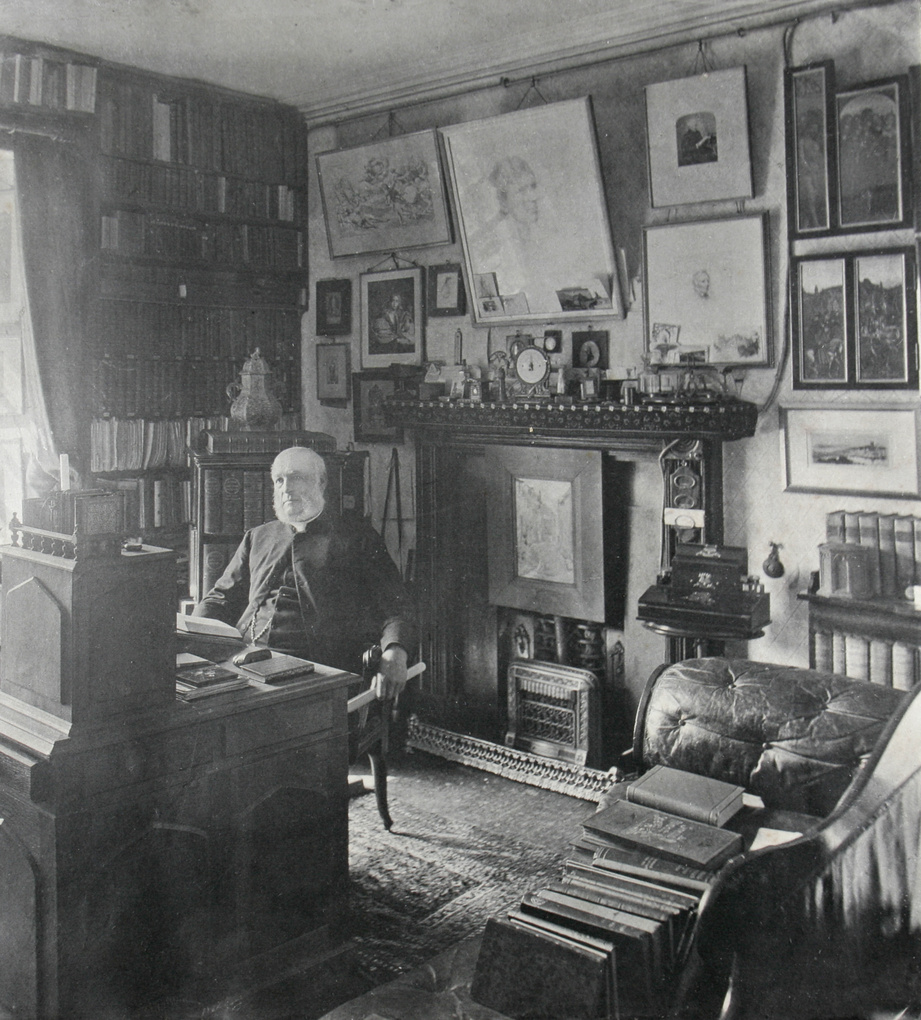 A man seated in a study