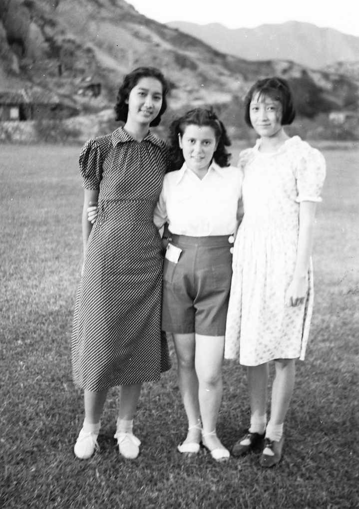 Bea and Gladys Hutchinson with an unidentified girl, near the Army Sports Ground, Mongkok, Hong Kong