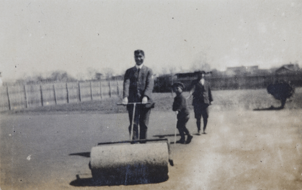 William Hutchinson with a lawn roller, 35 Tongshan Road, Hongkew, Shanghai