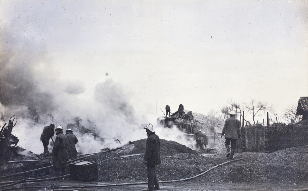 Firemen attending a large fire on the day of Chinese New Year, Shanghai, February 1920