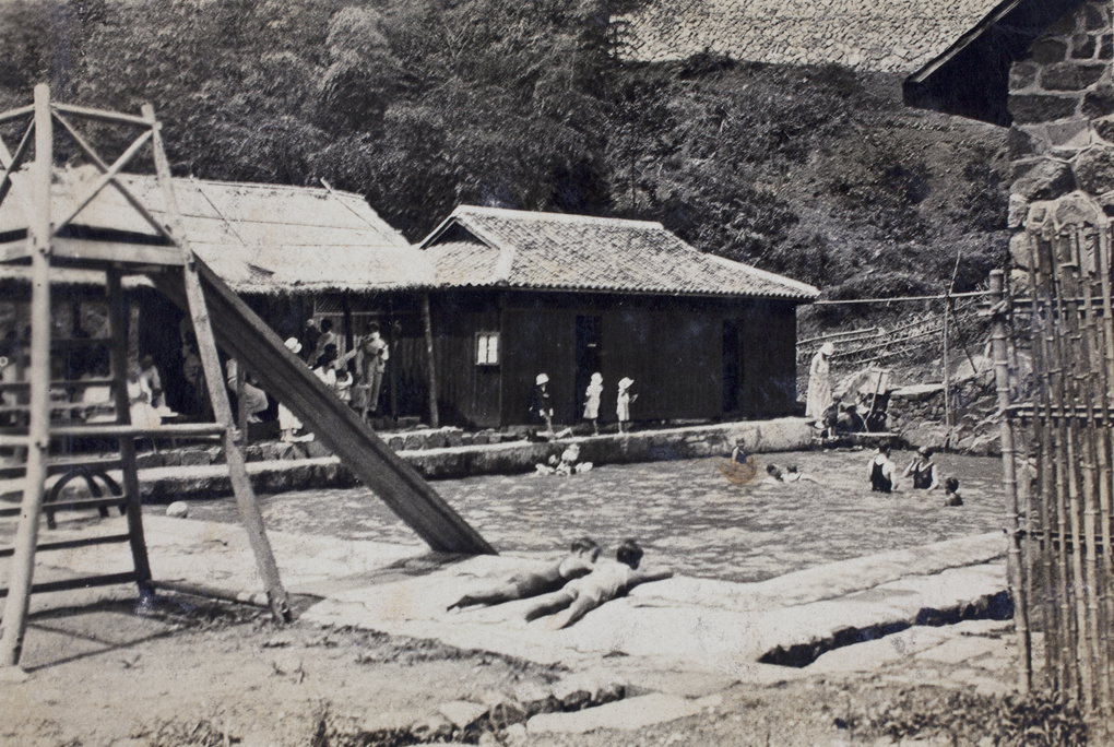 Families and bathers at an open air swimming pool, Moganshan