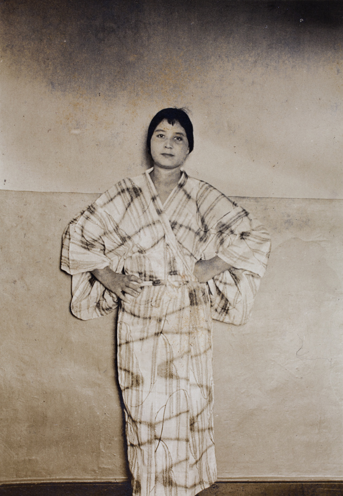 Sarah Hutchinson wearing a kimono made from fabric patterned with a 'rice plant in water' decorative motif, Shanghai
