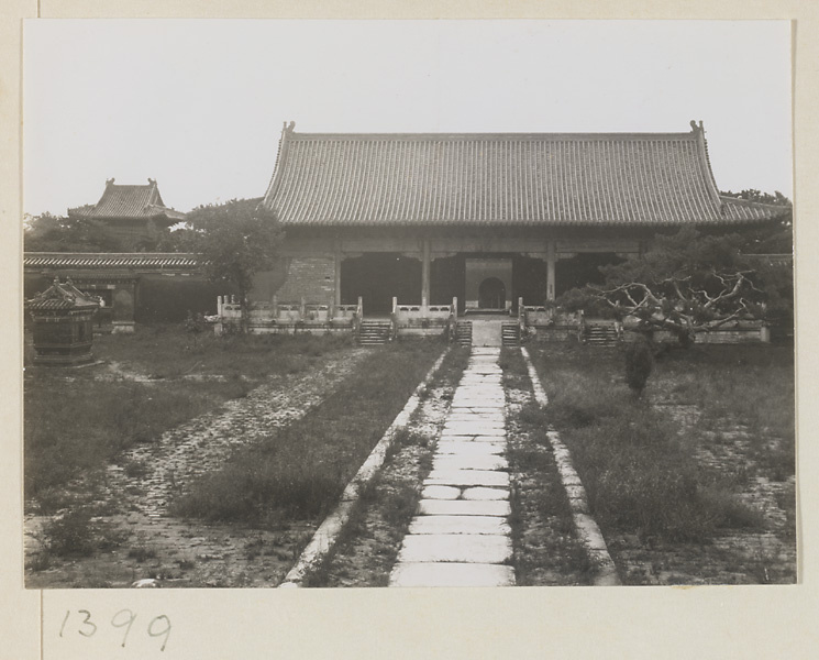 Second courtyard at Chang ling showing north facade of Ling en men, glazed-tile sacrificial stove for burning offerings, and Bei ting in first courtyard on far side of wall
