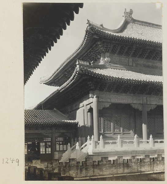Detail showing a corner of a double-eaved building with roof ornaments in the Forbidden City