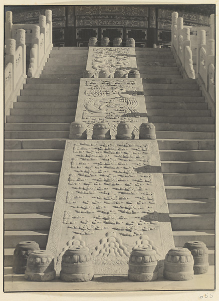 Detail showing carved marble slabs with cloud, phoenix, and dragon motifs on stairs at Qi nian dian