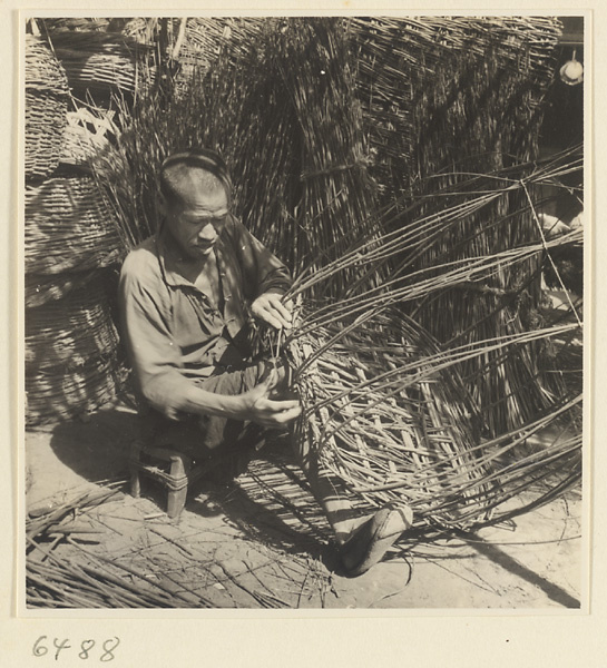 Man weaving a basket