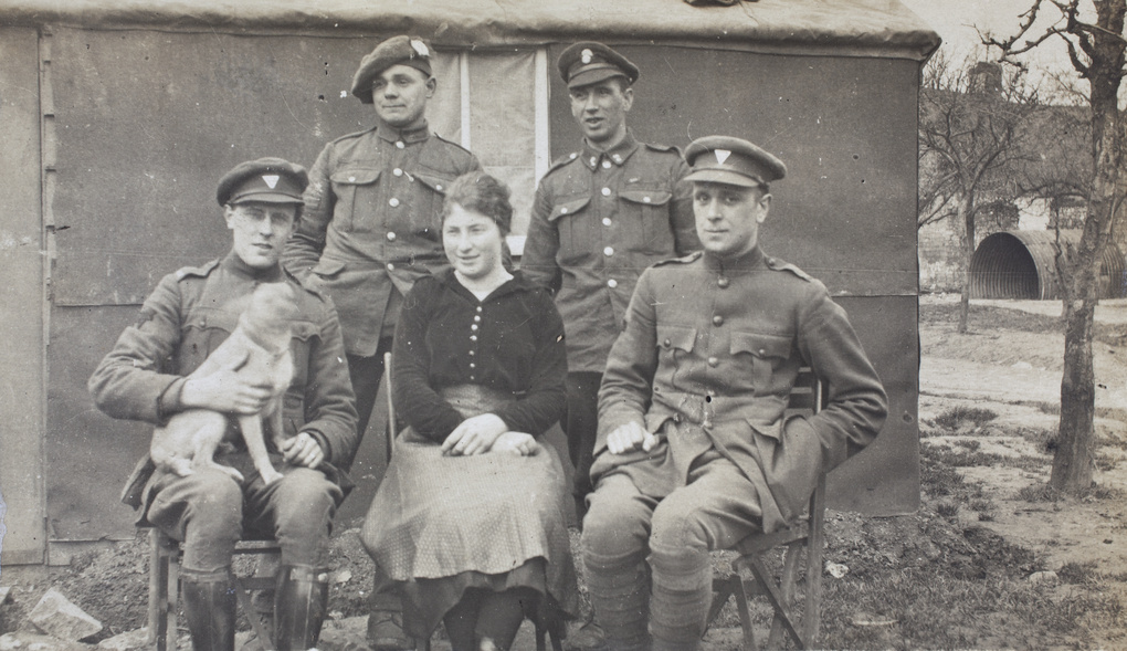 John Howard Stanfield, with other British soldiers, a woman and a dog