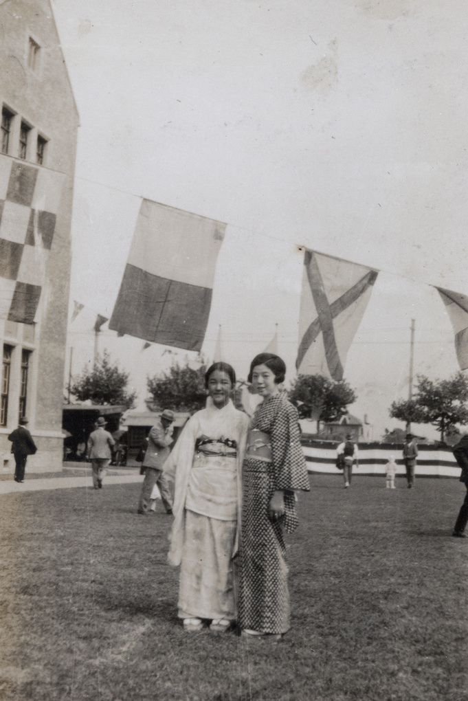 Two women at a sports event on the grounds of Mitsui & Co., Ltd. (三井物産) company buildings, Shanghai (上海)