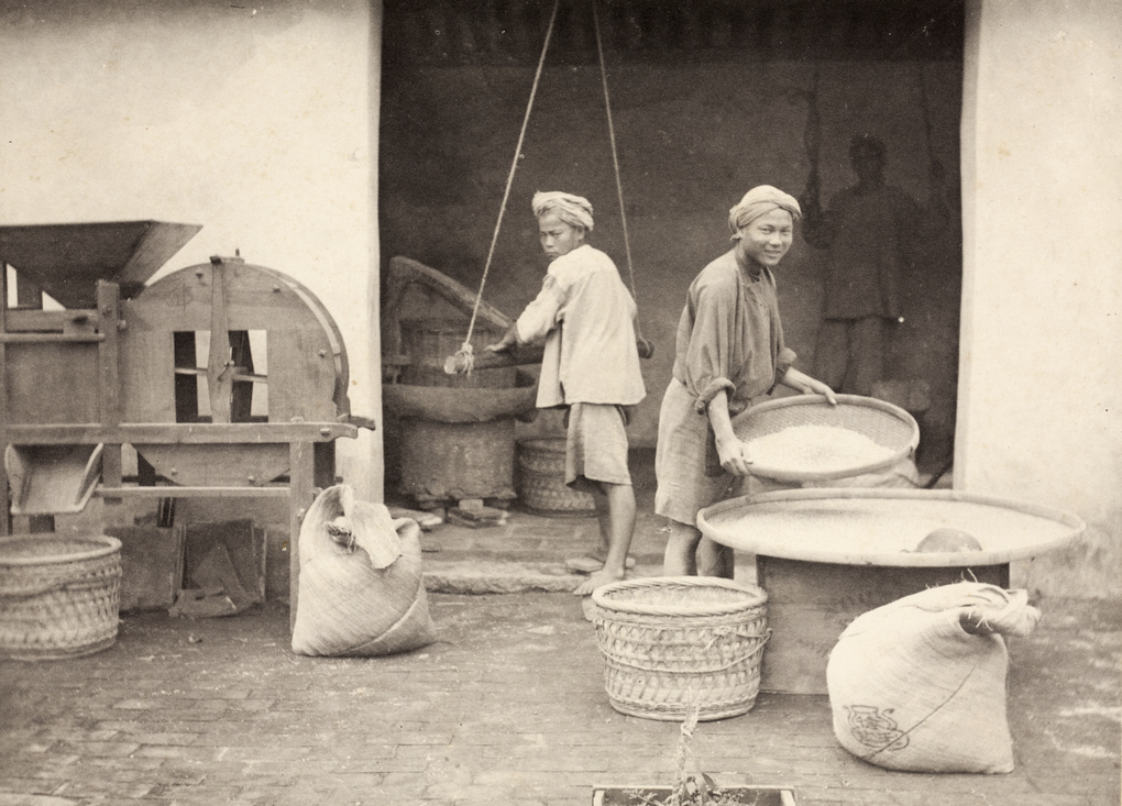 Men working in a rice processing mill
