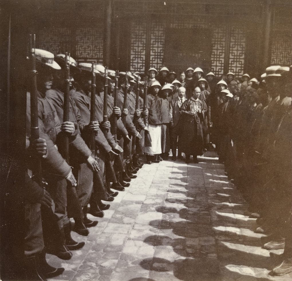 Chinese soldiers in line at departure of Lockhart and Barnes, Chi-nan