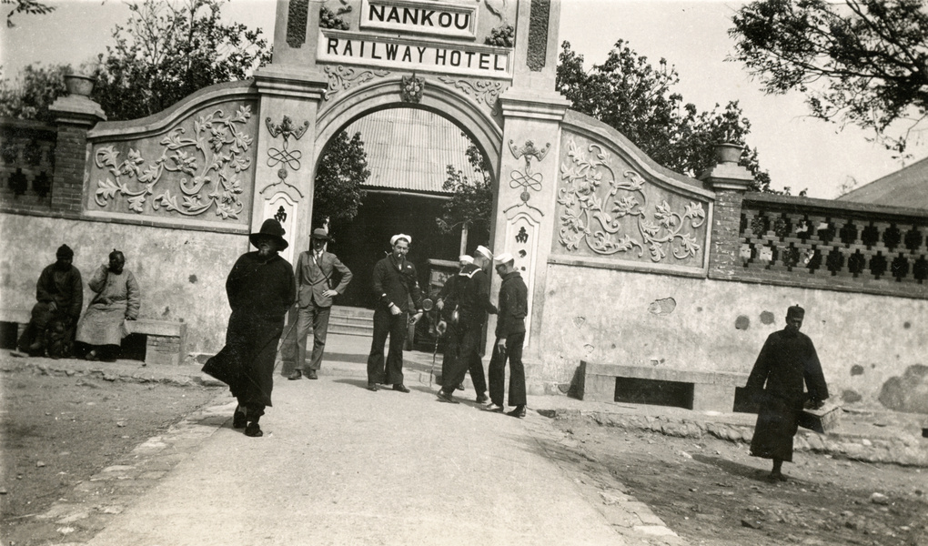Entrance gate to Nankou Railway Hotel, with United States naval personnel