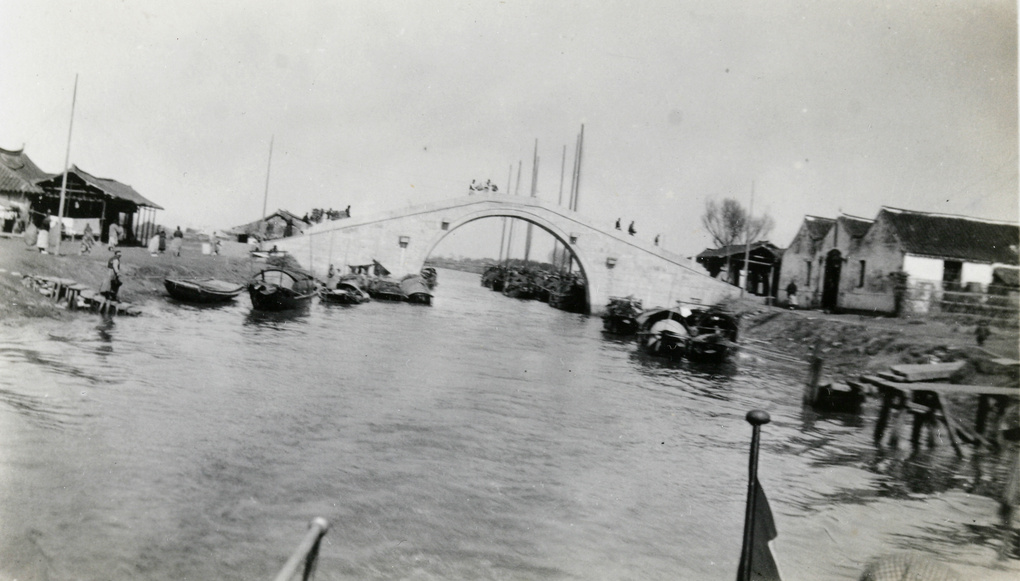 Bridge and berthed boats