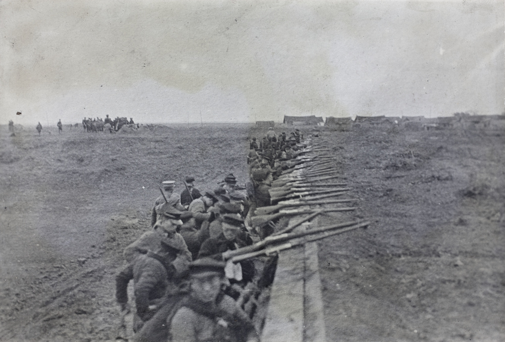 Revolutionary troops holding a fire trench