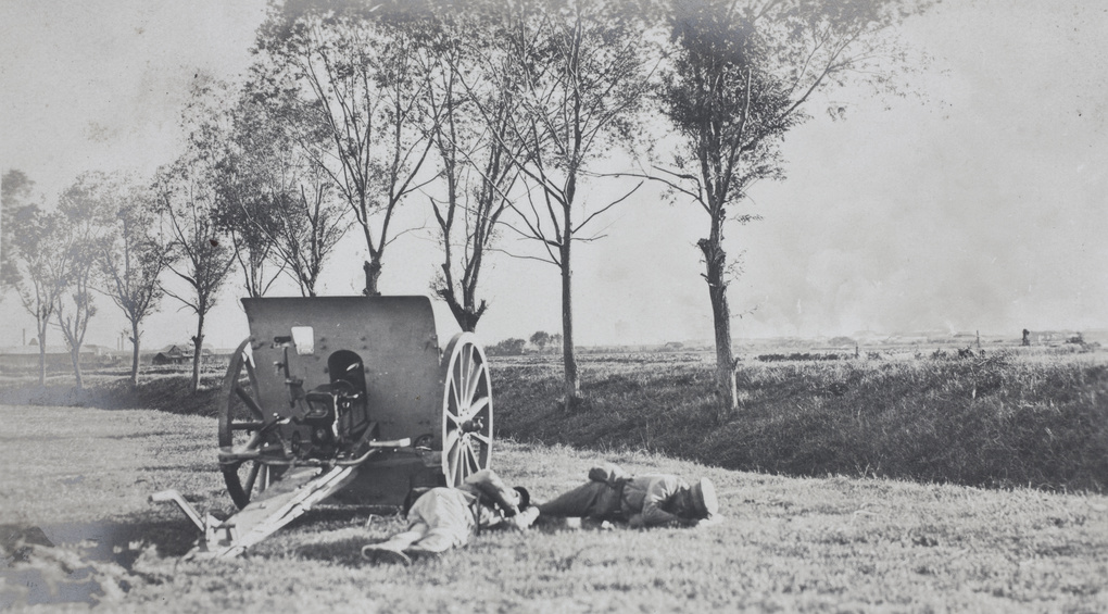 Qing army soldiers napping beside a field gun