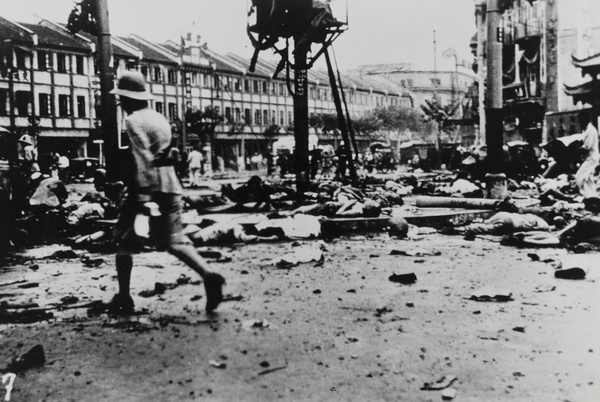 Aftermath of 'Bloody Saturday' bombing in Ave Edward VII, Shanghai - outside the Great World Entertainment Centre (Dashijie 上海大世界), 14 August 1937