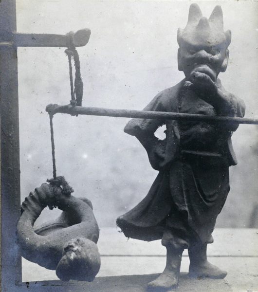 Grotesque clay figurines, a tableau relating to sin, punishment, torture and reincarnation