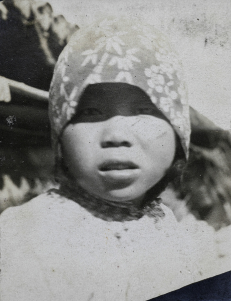 Portrait of a girl wearing a headscarf