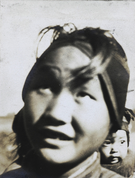 A rural woman with a baby, Taihu region west of Shanghai