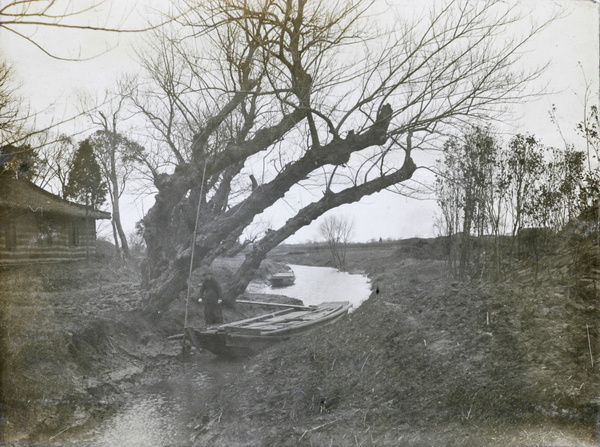 A boat and boatman, near Shanghai