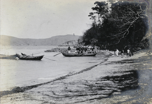 A ferry-boat by a beach