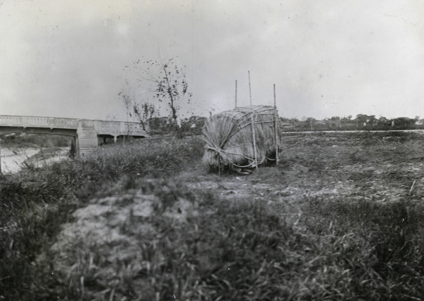 A temporary grave, by a concrete bridge