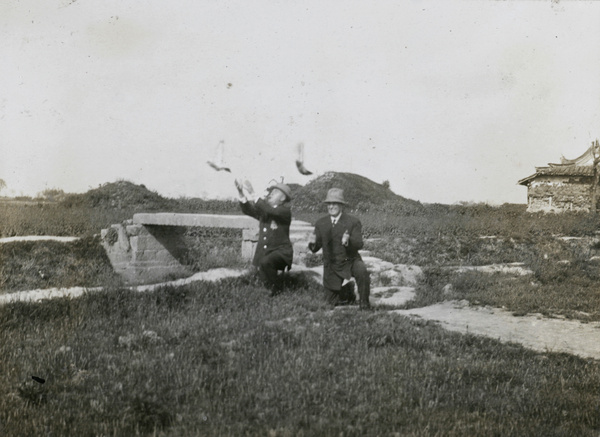 Releasing homing pigeons by a bridge