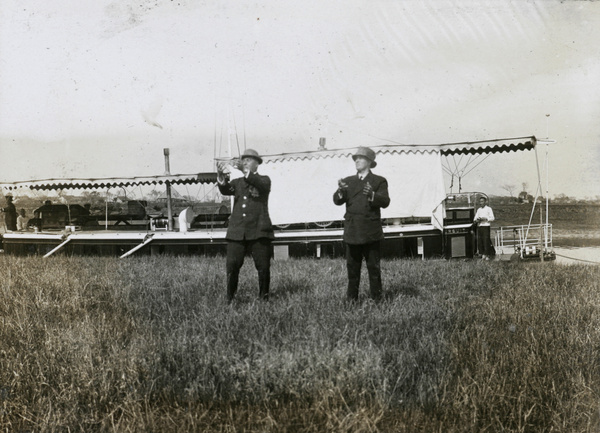 Releasing homing pigeons by a leisure boat