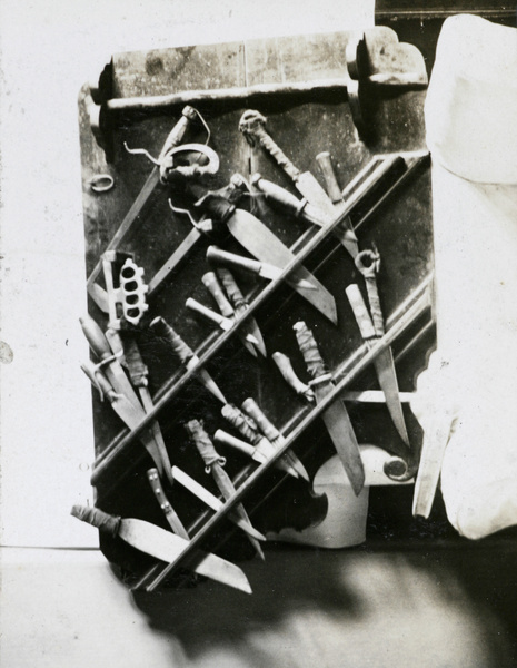 Knives and daggers in a display case