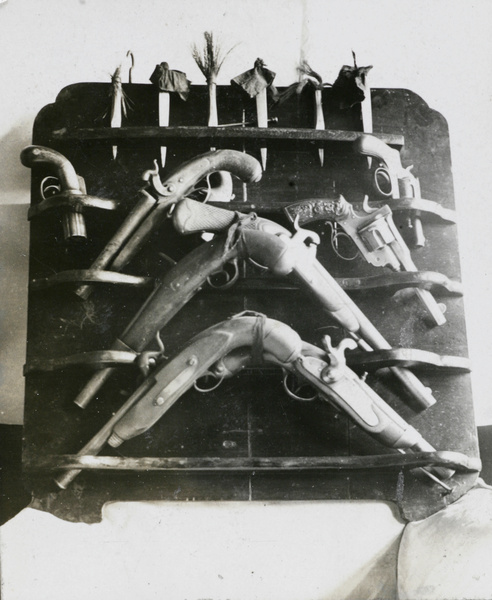 A display case of pistols and revolvers