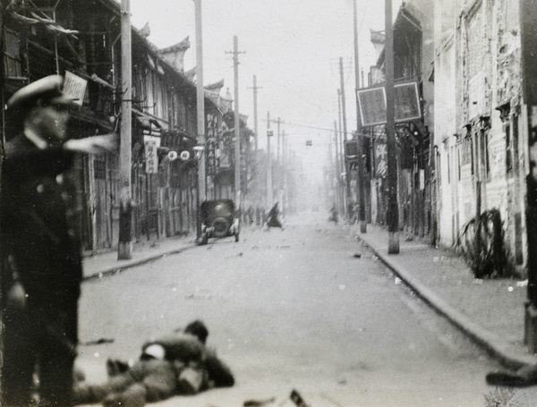 Naval officer in street, March 1927