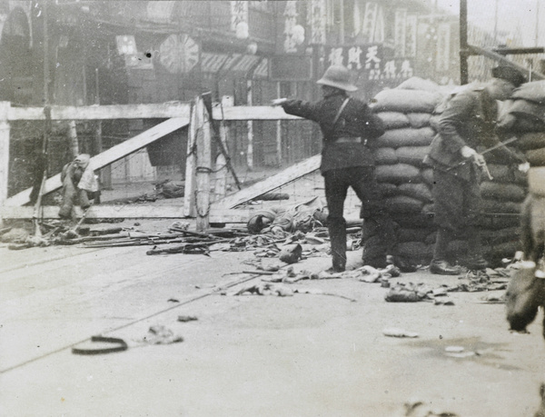 Policemen in North Chekiang (Zhejiang) Road, Shanghai, 1927