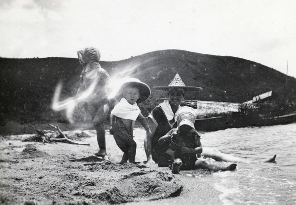 Family playing on beach