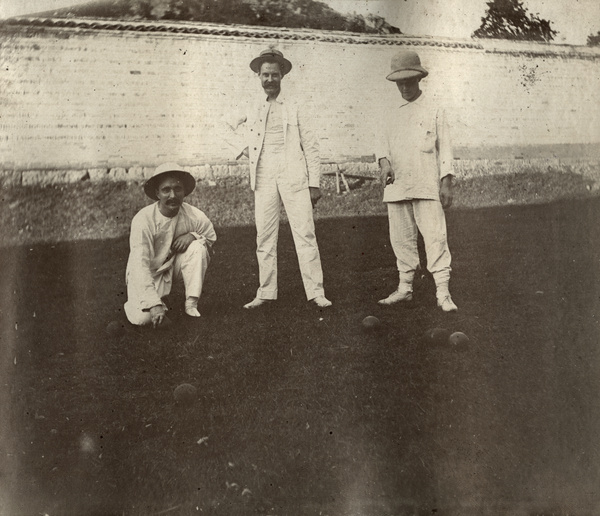 Rev. F. Child, Cunningham and Stevens playing bowls, Kweilin