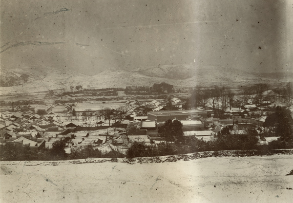 Stroked by silence, a snowy cityscape